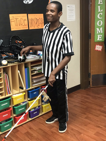 Child in ref outfit