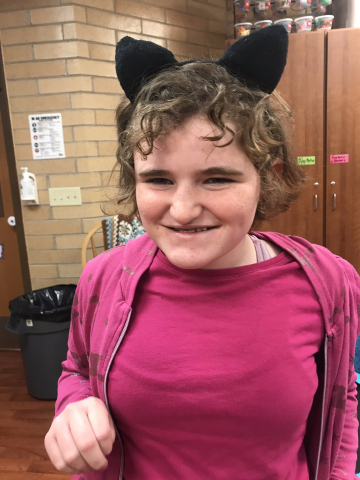Child with cat ears on