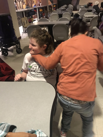 two children hugging