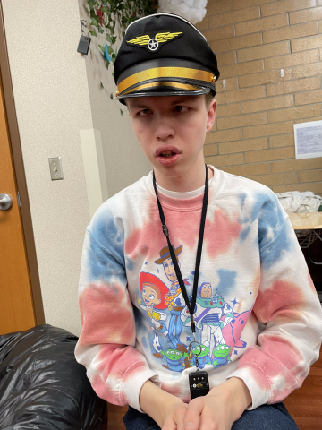 boy wearing pilots hat 