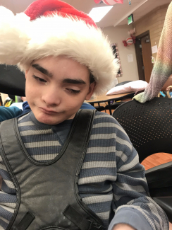 Child with Santa hat on